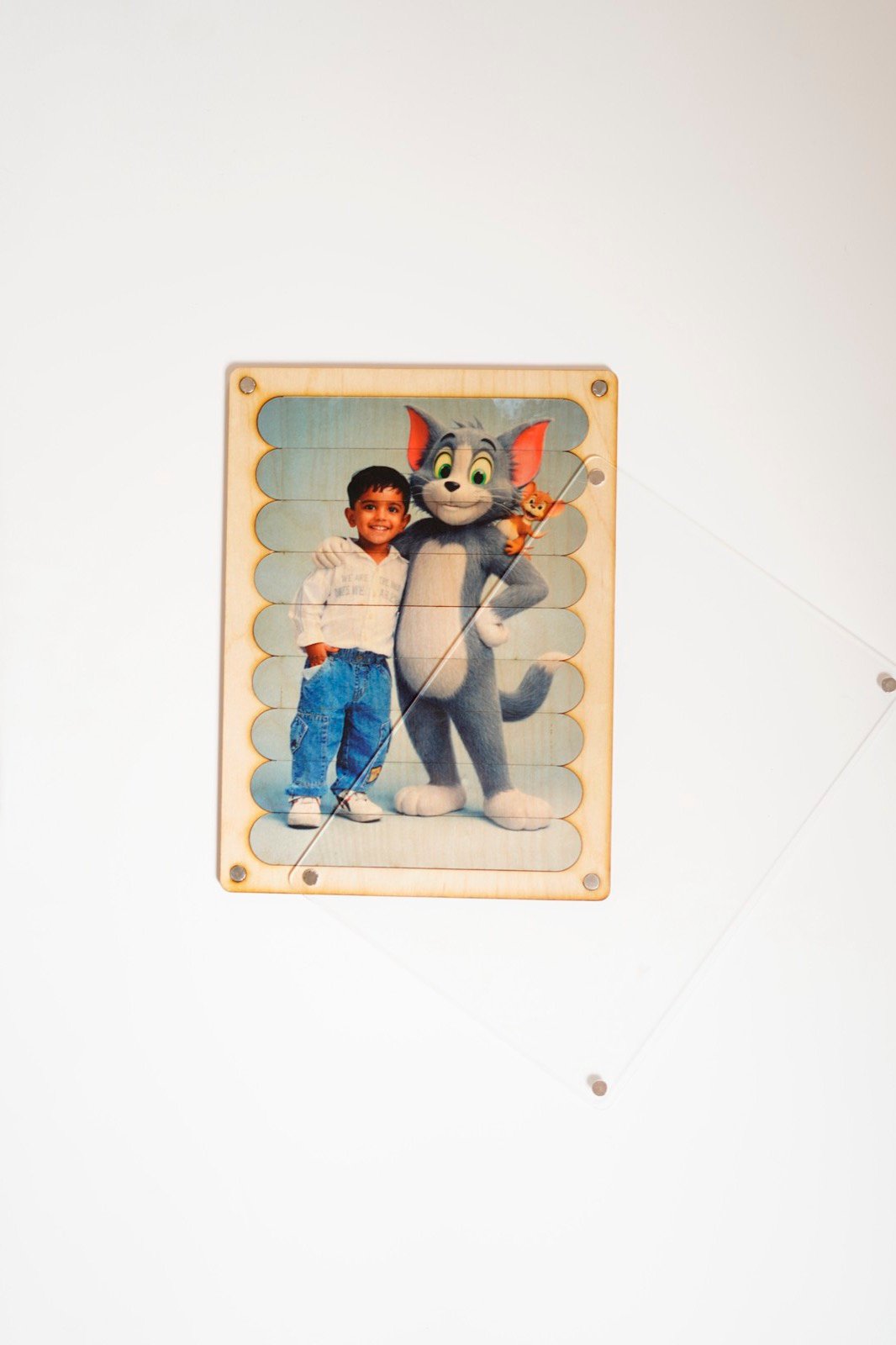 Completed FixMe puzzle hanging on the wall like a photo frame, with clear acrylic cover